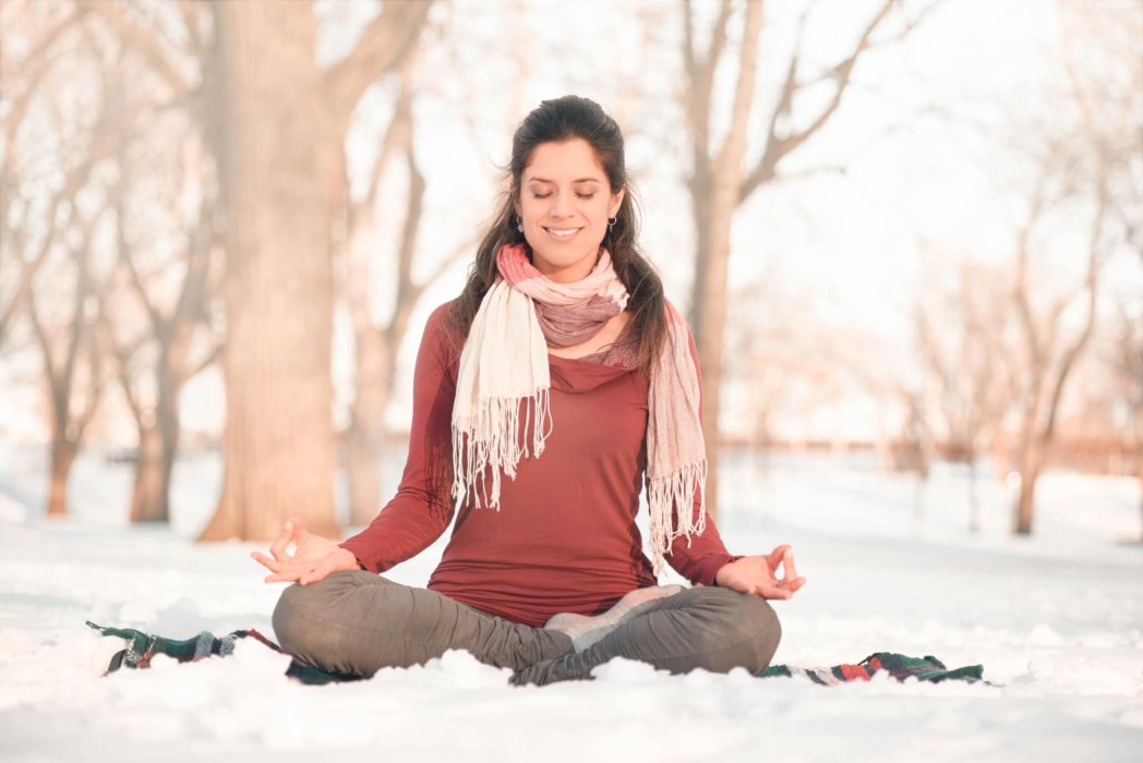 Attractive,Mixed,Race,Woman,Doing,Yoga,In,Nature,At,Winter